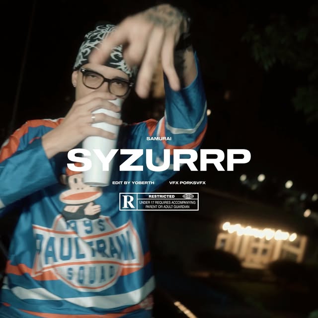 Frame do clipe SYZURRP com artista em primeiro plano